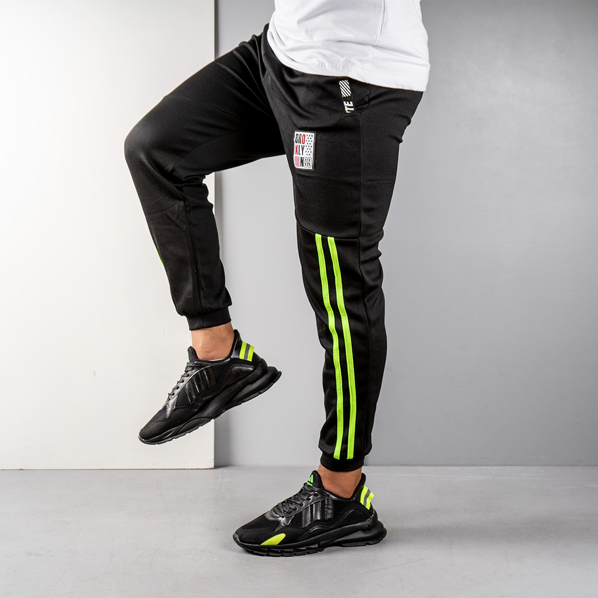 شلوار اسلش مردانه مشکی سبز مدل G52(T)