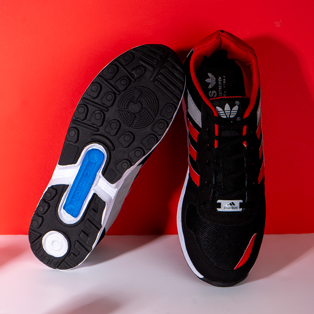 کفش ورزشی مردانه مشکی قرمز مدل ZX7000