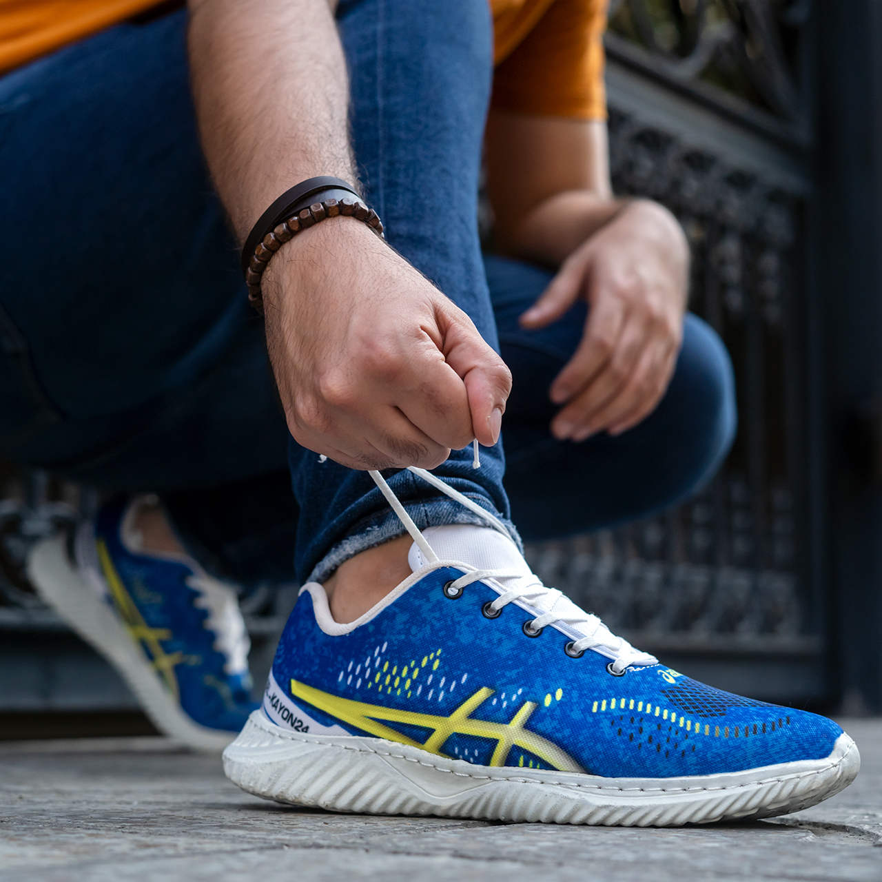 کفش مردانه اسیکس آبی زرد (T) مدل dahak