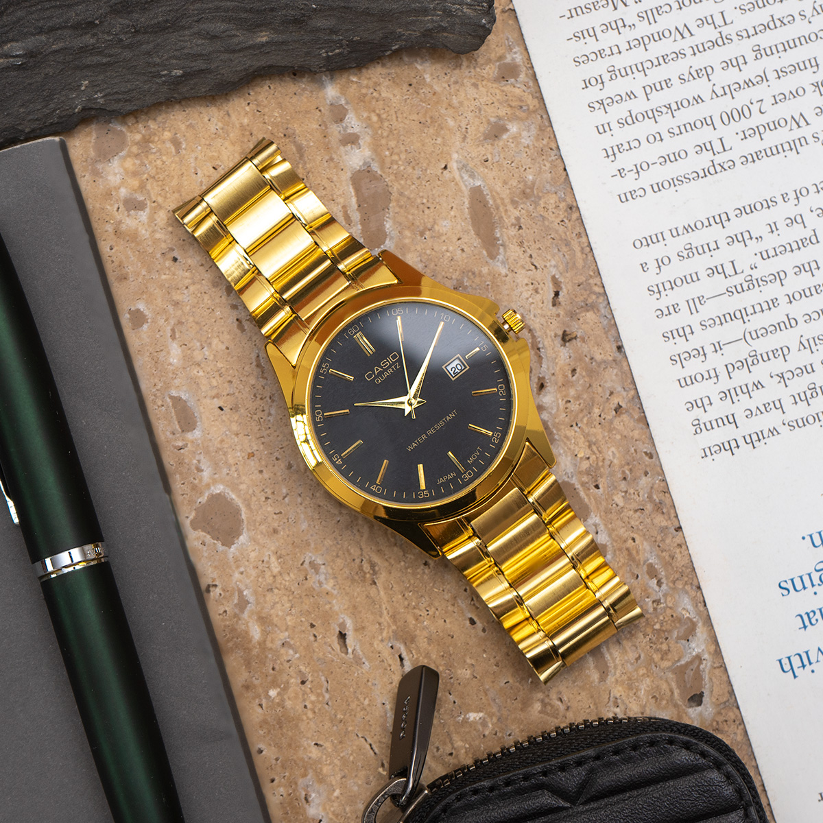 ساعت عقربه ای طلایی صفحه مشکی Casio مدل Edmon