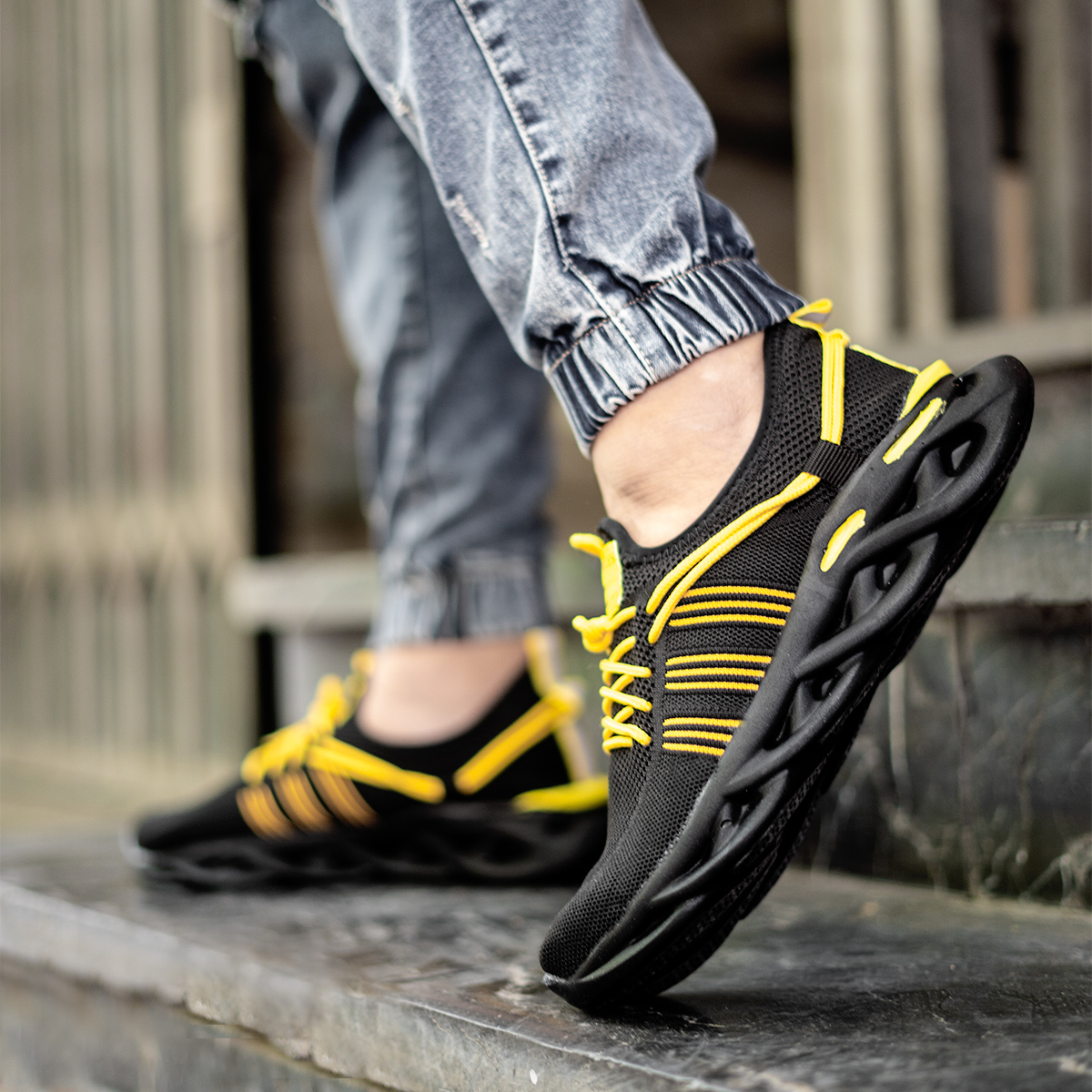 کفش ورزشی مشکی زرد مردانه مدل Arisan