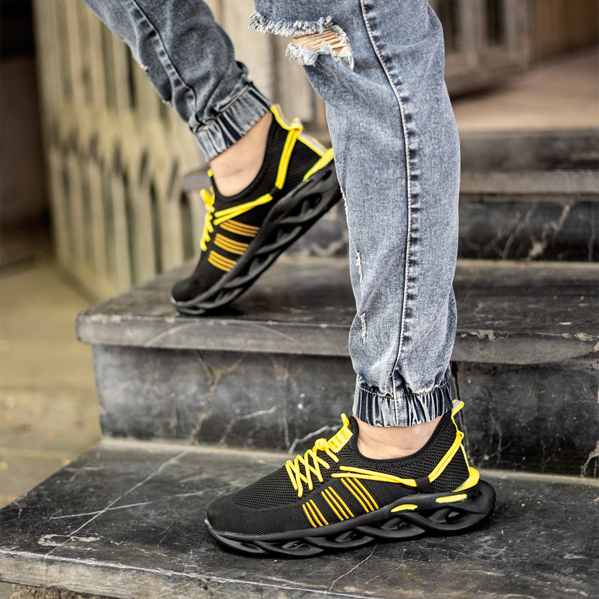 کفش ورزشی مشکی زرد مردانه مدل Arisan