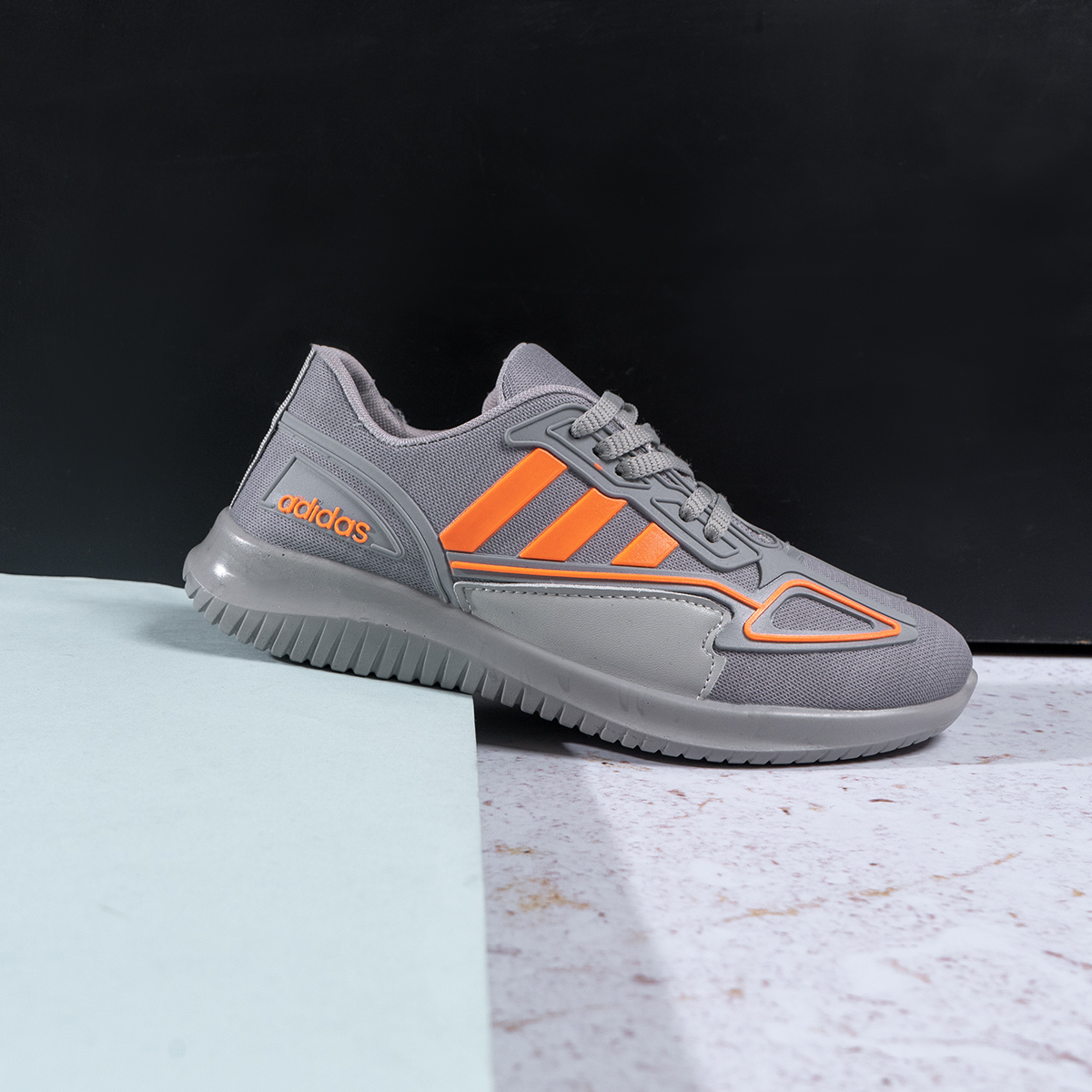 کفش ورزشی Adidas دخترانه طوسی نارنجی مدل Kiana