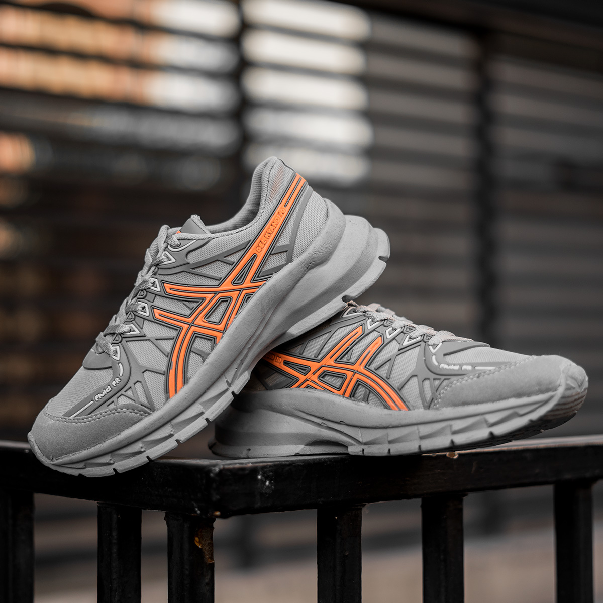 کفش ورزشی Asics زنانه طوسی نارنجی مدل Tina